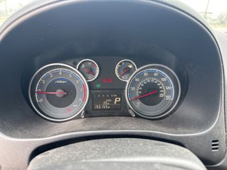 2011 Suzuki SX4 - Interior Dashboard With Vehicle Running Image